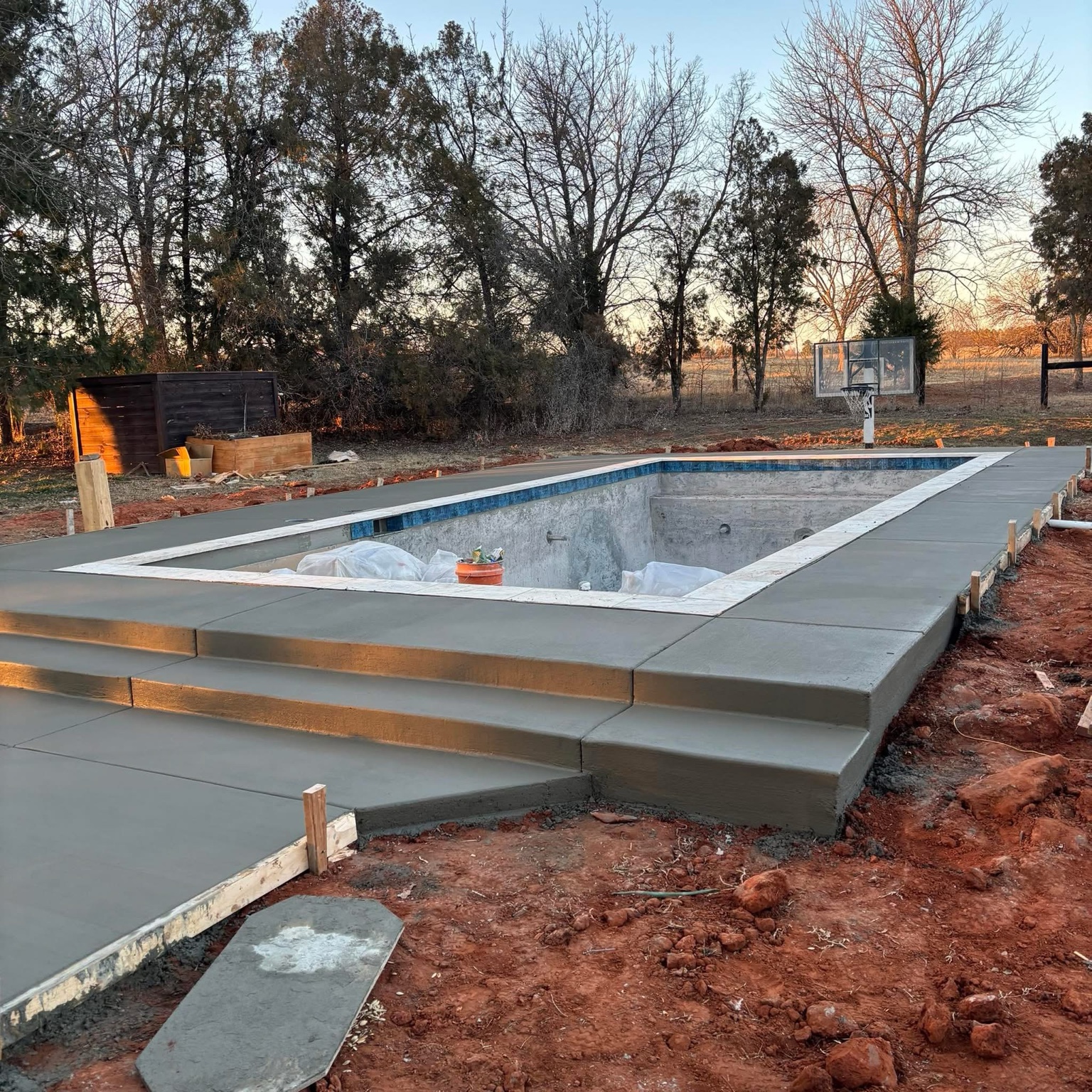 Concrete steps and pool deck
